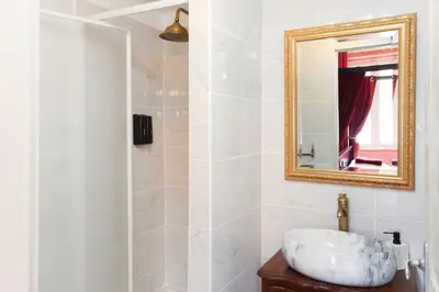 a bathroom with a sink and a mirror at HARRY POTTER - Escape Game - Expérience Magique in Carcassonne