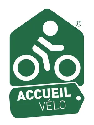 a green sign with a sign for aocalcil veoda at Le 9 de Cour, Chambre Caouette in Carcassonne