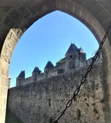 a view of a castle through a bridge at CheRiedel Bed & Breakfast & Art Gallery in Azillanet
