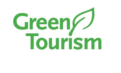a green logo for a green tourism company at Chateau de Pourpry in Damiatte