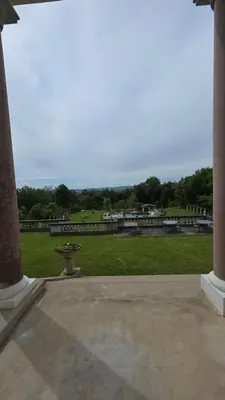 a view of a park with a birdbath in a yard at Chateau de Pourpry in Damiatte