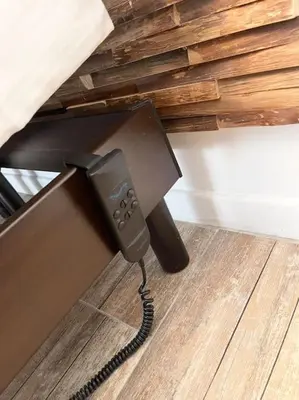 a telephone sitting on the floor in a room at Chez-YU in Carcassonne