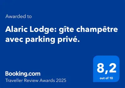 a screenshot of a phone with aania lodge gift championship axe parking prize at Alaric Lodge: gîte champêtre avec parking privé. in Comigne