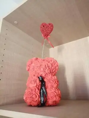 a pink cake with a heart and a balloon at EVANA in Bize-Minervois