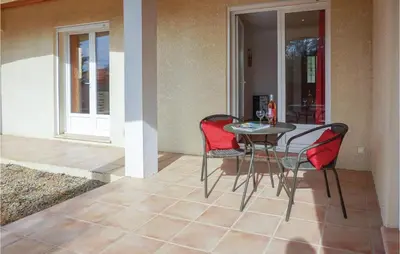 a table and four chairs on a patio at Stunning Home In Ferrals Les Corbières in Ferrals-lès-Corbières