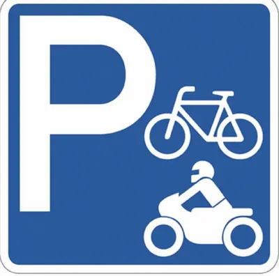 a sign with a bike and a man on a motorcycle at bienvenue chez nous in Badens