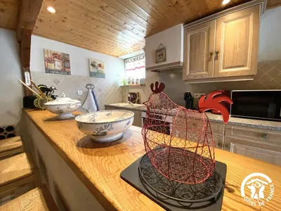 a kitchen with a counter with bowls on it at Dame nature in La Tourette-Cabardès