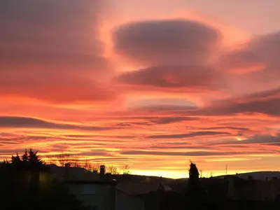 a sunset with a red and orange sky at Le Camping de Cucugnan in Cucugnan