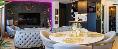 a dining room with a table and chairs at Magnifique loft / spa en face de la cathédrale ! in Narbonne