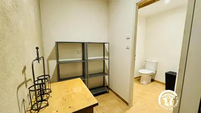 a room with a bathroom with a toilet in it at Le cazal in Sainte-Eulalie