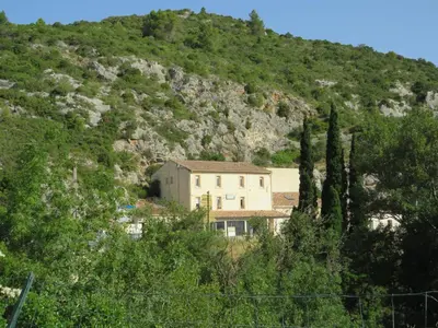 a house on the side of a mountain at Villa Ripaud Chambre d'Hôte in Villesèque-des-Corbières