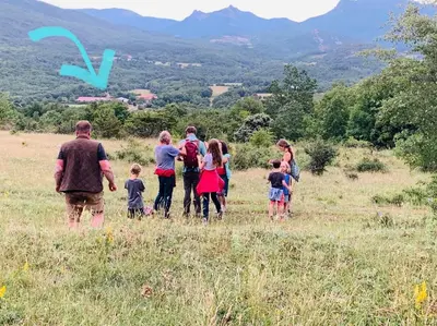 a group of people standing in a field at Gîte de la Bastide - Cabania Pays Cathare in Camps-sur-lʼAgly