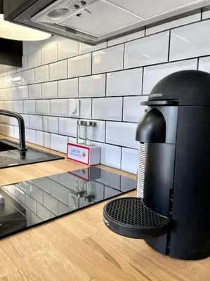 a coffee maker sitting on a counter in a kitchen at NEW, La Passante, Belle vue in Conques-sur-Orbiel