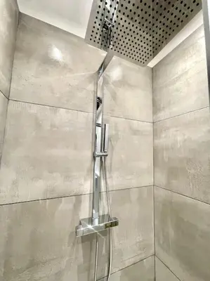 a shower with a glass door in a bathroom at NEW, La Passante, Belle vue in Conques-sur-Orbiel