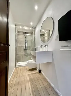 a bathroom with a shower and a sink and a mirror at NEW, La Passante, Belle vue in Conques-sur-Orbiel