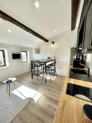 a large living room with a table and chairs at NEW, La Passante, Belle vue in Conques-sur-Orbiel
