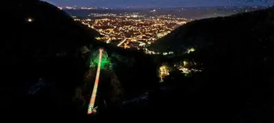 a view of a city from a mountain at night at Mazamet : Résidence du Musée centre ville. in Mazamet