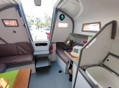 an interior view of an rv with a desk at St Helene in Gruissan