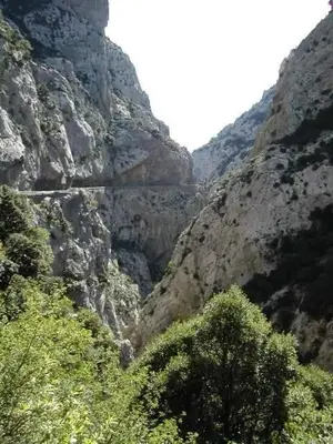 a mountain with a road in the middle of it at le balcon in Camps-sur-lʼAgly