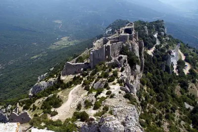 a castle on the side of a mountain at le balcon in Camps-sur-lʼAgly