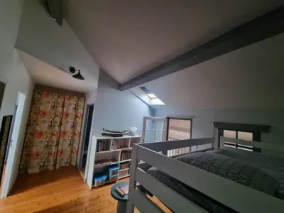 a bedroom with a bunk bed in a room at La Marceline 1 - Appart entre mer et canal du midi en pays Cathare in Saint-Marcel