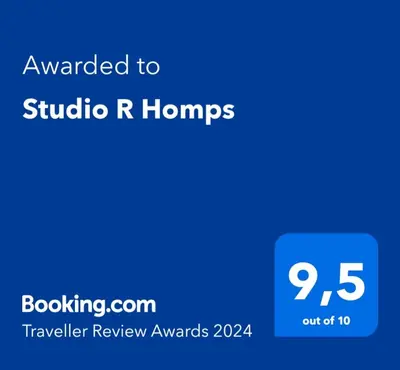 a screenshot of a phone with the text awarded to studio r honors at Studio R Homps in Homps
