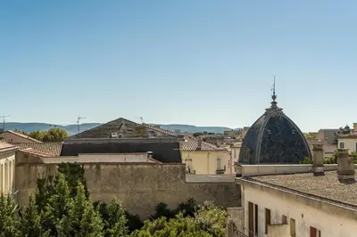 a view of a city from the roof of a building at The Gatsby room - 50m des halles - Design avec ascenseur in Narbonne