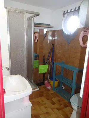 a bathroom with a shower and a sink and a toilet at Studio Plage 200m Parking gratuit Port la Nouvelle in Port-la-Nouvelle