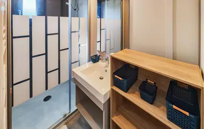 a bathroom with a sink and a shower at Gorgeous Home In Olonzac With Kitchen in Olonzac