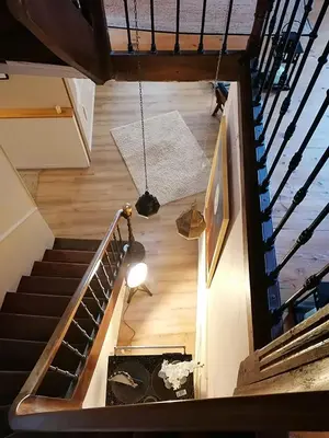 an overhead view of a staircase in a house at Autour d'une Toile in Rouvenac