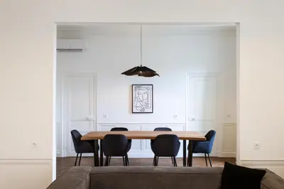 a dining room with a table and chairs at La Pittoresque 1 in Carcassonne