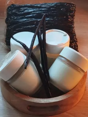 a bowl filled with candles on a table at Le Mas Victoria - Chambres d'hôtes avec table d'hôtes-Parking privé ferme in Carcassonne