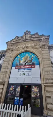 a building with a sign on the front of it at La Robine in Narbonne