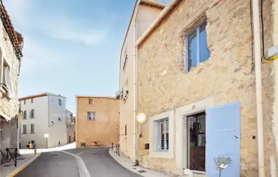 an alley in an old town with buildings at Gorgeous Home In Villeseque Des Corbier in Villesèque-des-Corbières