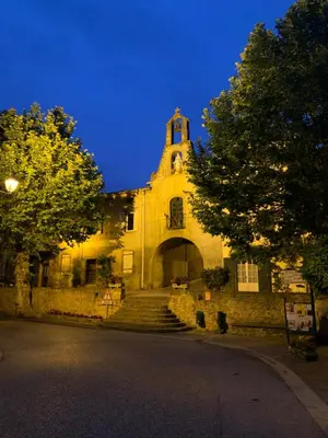a church with a tower and stairs in front of it at Cosy Camon Bolt-Hole in Camon