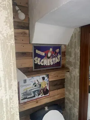 a picture of a movie on a wooden wall at Propriétaire privé in Carcassonne