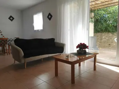 a living room with a couch and a coffee table at Rouvenac in Trilla
