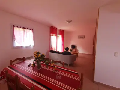 a living room with a couch and a table at Lou soula in Trilla