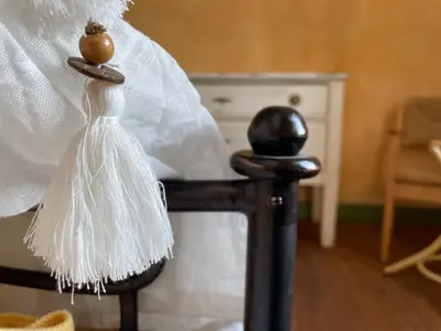 a plastic dress on a chair with an apple on it at Große Ferienwohnung am Canal du MIDI mit Dachterrrasse in Homps