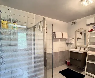 a bathroom with a shower and a sink at Gîte - Holiday Home Vent Autan in Limoux