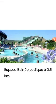 a group of people in a swimming pool at a resort at Le clin d'oeil sur le port. in Gruissan