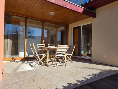 a patio with a table and chairs on a house at Evasion en pays Cathare in Quillan