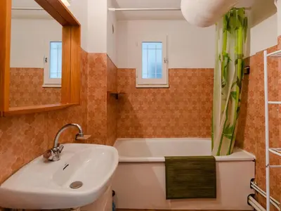 a bathroom with a sink and a bath tub at T2 avec Piscine à Gruissan - Proche Plage et Commerces - FR-1-409A-14 in Gruissan