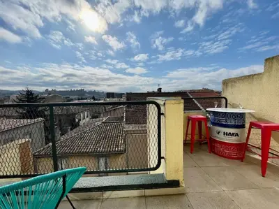 a view from a balcony with a table and chairs at Duplex 70m2 - Vue Cité Mediévale - Parking gratuit in Carcassonne