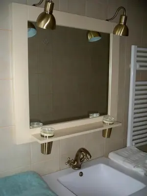 a bathroom with a sink and a mirror and a tub at Hong Kong Guest room in the heart of the vineyard no69 in Badens