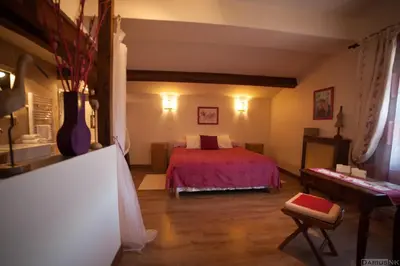 a bedroom with a bed and a table in a room at Wellington Guest Room in the heart of the vineyard no1205 in Badens