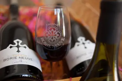 a group of three bottles of wine on a table at Wellington Guest Room in the heart of the vineyard no1205 in Badens