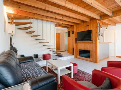 a living room with a couch and a table at Villa spacieuse à Gruissan, 4 chambres, jardin privé, clim, proche plage, idéal familles/amis - FR-1-409A-18 in Gruissan