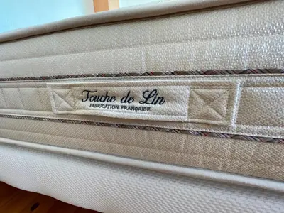 a white suitcase with the name tamale de la line on it at Lauraguel Gîte in Mourvilles-Hautes
