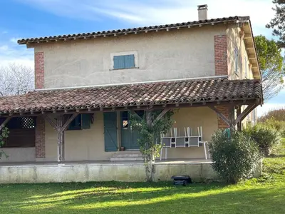an old house with a window and a roof at Lauraguel Gîte in Mourvilles-Hautes